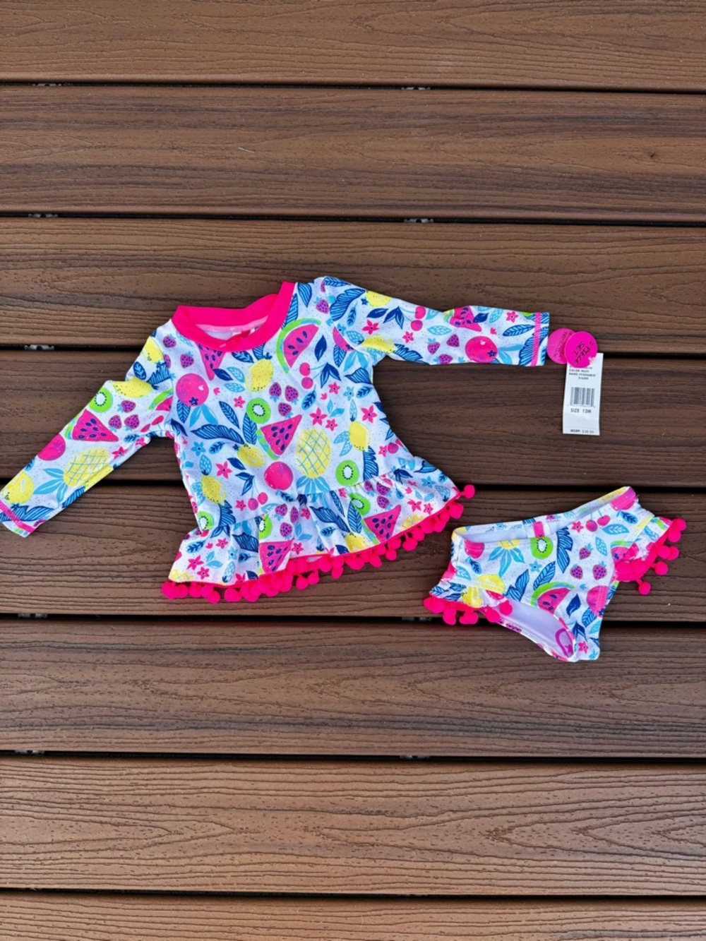 Betsy Johnson Baby Two-Piece Rash Guard Swimsuit with Fruit and Pink Pom Poms